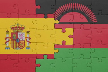 Malawi 'nin renkli ulusal bayrağı ve İspanya bayrağı ile bulmaca. konsept