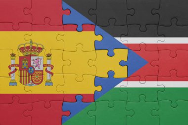 Güney Sudan 'ın renkli ulusal bayrağı ve İspanya bayrağı ile bulmaca. konsept