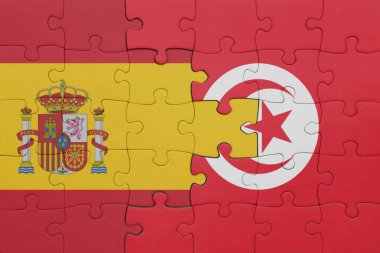 Tunus 'un renkli ulusal bayrağı ve İspanya bayrağı ile bulmaca. konsept