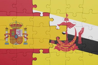 Brunei 'nin renkli ulusal bayrağı ve İspanya bayrağı ile bulmaca. konsept