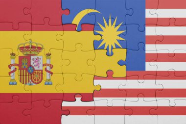 Malezya 'nın renkli ulusal bayrağı ve İspanya bayrağı. konsept