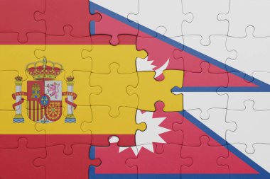 Nepal ve İspanya bayrağının renkli ulusal bayrağıyla bulmaca. konsept