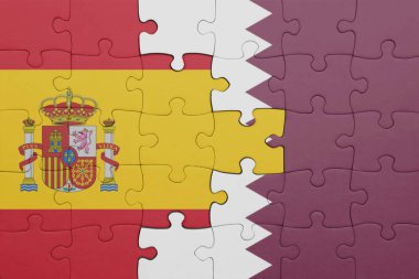 Katar 'ın renkli ulusal bayrağı ve İspanya bayrağı ile bulmaca. konsept
