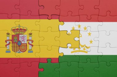 Tacikistan 'ın renkli ulusal bayrağı ve İspanya bayrağı. konsept