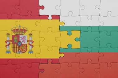 İspanya bayrağı ve Bulgar bayrağının rengarenk ulusal bayrağıyla bulmaca. konsept