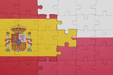 Polonya 'nın renkli ulusal bayrağı ve İspanya bayrağının bulmacası. konsept