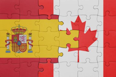 Kanada 'nın renkli ulusal bayrağı ve İspanya bayrağı ile bulmaca. konsept