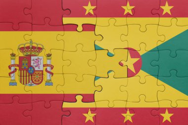 Grenada 'nın renkli ulusal bayrağı ve İspanya bayrağı ile bulmaca. konsept
