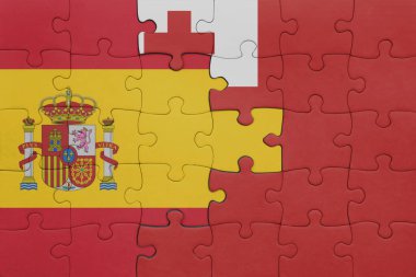 Tonga 'nın renkli ulusal bayrağı ve İspanya bayrağı ile bulmaca. konsept