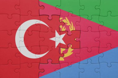 Eritrea bayrağı ve hindi bayraklarıyla dolu renkli bir yapboz. konsept