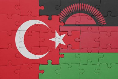 Malawi bayrağı ve hindi bayraklarıyla dolu renkli bir yapboz. konsept
