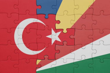 Seyşel bayrağı ve hindi bayraklarıyla dolu renkli bir yapboz. konsept