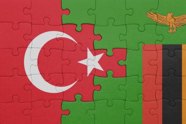Zambiya bayrağı ve hindi bayraklarıyla dolu renkli bir bulmaca. konsept