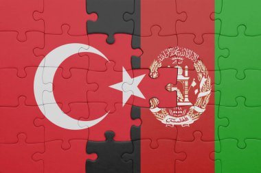 Afgan bayrağı ve hindi bayraklarıyla dolu renkli bir yapboz. konsept