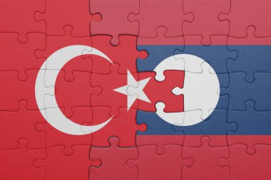 Laoların renkli ulusal bayrağı ve hindi bayraklarıyla dolu bir bulmaca. konsept