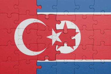 Kuzey Kore 'nin renkli ulusal bayrağı ve hindi bayrağıyla bulmaca. konsept