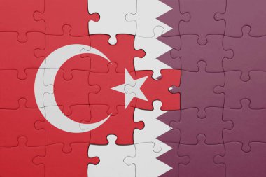 Katar 'ın renkli ulusal bayrağı ve hindi bayrağı ile bulmaca. konsept