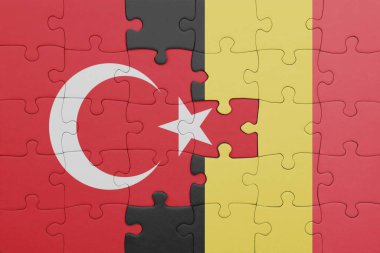 Belçika 'nın renkli bayrağı ve hindi bayraklarıyla dolu bir yapboz. konsept