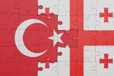 Gürcistan 'ın renkli ulusal bayrağı ve hindi bayrağı ile bulmaca. konsept