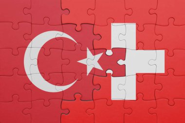İsviçre bayrağı ve hindi bayraklarıyla dolu renkli bir bulmaca. konsept