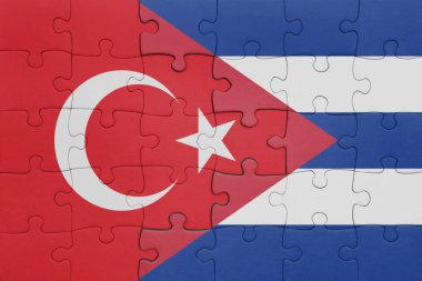 Küba 'nın renkli ulusal bayrağı ve hindi bayraklarıyla dolu bir bulmaca. konsept