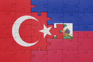 Haiti 'nin renkli ulusal bayrağı ve hindi bayrağı ile bulmaca. konsept