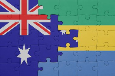 Avustralya bayrağı ve Gabon 'un renkli ulusal bayrağıyla bulmaca. konsept