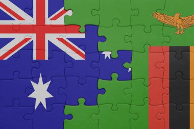 Zambiya 'nın renkli ulusal bayrağı ve Avustralya bayrağı ile bulmaca. konsept