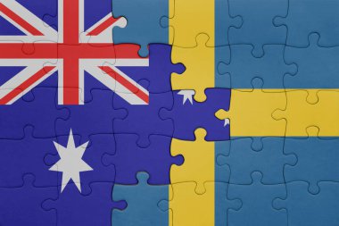 Avustralya bayrağı ve İsveç 'in renkli ulusal bayrağıyla bulmaca. konsept