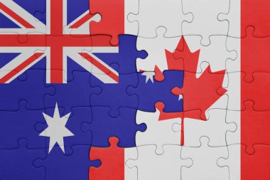 Kanada bayrağı ve Avustralya bayrağının rengarenk yapbozu. konsept