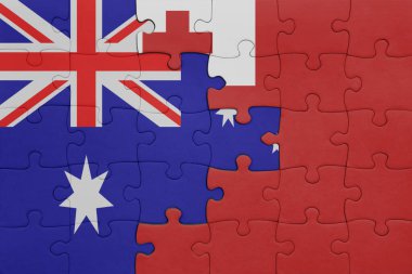 Tonga 'nın renkli ulusal bayrağı ve Avustralya bayrağı ile bulmaca. konsept