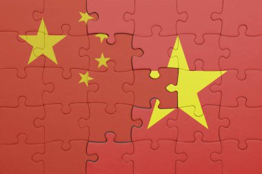 Vietnam ve Çin bayrağının renkli ulusal bayrağıyla bulmaca. konsept
