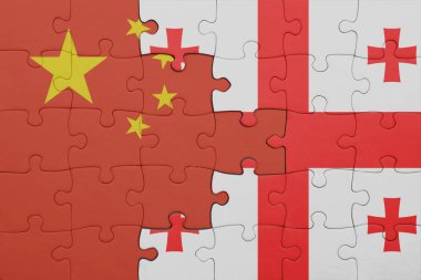 Gürcistan ve Çin bayrağının renkli ulusal bayrağıyla bulmaca. konsept