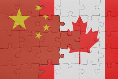 Kanada bayrağı ve Çin bayrağının rengarenk yapbozu. konsept