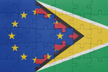 Guyana 'nın renkli ulusal bayrağı ve Avrupa Birliği bayrağı bulmacası. konsept