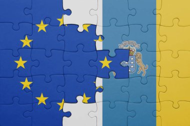 Kanarya adalarının renkli ulusal bayrağı ve Avrupa Birliği bayrağıyla ilgili bulmacalar. konsept