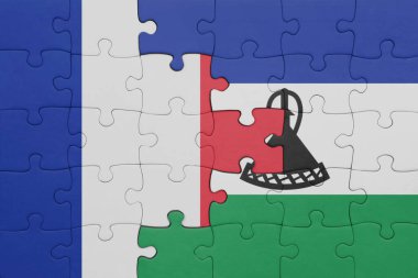 Lesotho ve Fransa bayrağının renkli ulusal bayrağıyla bulmaca. konsept