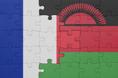 Malawi 'nin renkli ulusal bayrağı ve Fransa bayrağı ile bulmaca. konsept