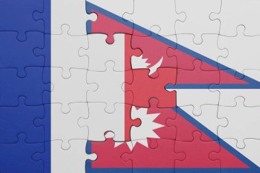 Nepal bayrağı ve Fransa bayrağının renkli ulusal bayrağıyla bulmaca. konsept