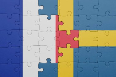 İsveç bayrağı ve Fransa bayrağının renkli ulusal bayrağıyla bulmaca. konsept