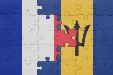 Barbados 'un renkli ulusal bayrağı ve Fransa bayrağı ile bulmaca. konsept