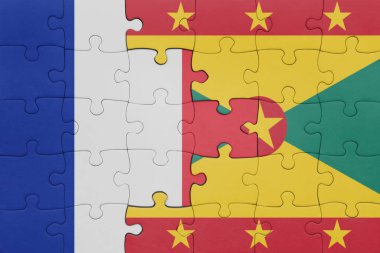 Grenada bayrağı ve Fransa bayrağının rengarenk yapbozu. konsept
