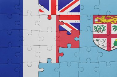 Fiji 'nin renkli ulusal bayrağı ve Fransa bayrağının bulmacası. konsept