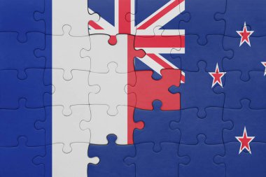 Yeni Zelanda 'nın renkli ulusal bayrağı ve Fransa bayrağının bulmacası. konsept