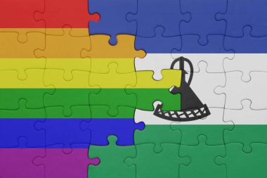 Lesotho ve gökkuşağı eşcinsellik bayrağının renkli ulusal bayrağıyla bulmaca. konsept