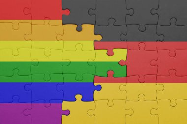 Almanya 'nın renkli ulusal bayrağı ve gökkuşağı eşcinsel gurur bayrağı ile bulmaca. konsept