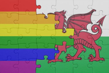 Galler 'in renkli ulusal bayrağı ve gökkuşağı eşcinsellik gururu bayrağı. konsept