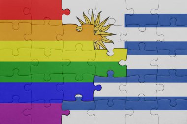 Uruguay 'ın renkli ulusal bayrağı ve gökkuşağı eşcinsellik gururu bayrağı. konsept