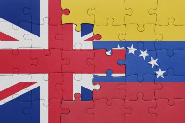 Venezuela 'nın renkli ulusal bayrağı ve Büyük Britanya bayrağı ile bulmaca. konsept