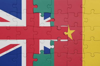Kamerun ve Büyük Britanya bayrağının renkli ulusal bayrağıyla bulmaca. konsept